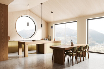 Wooden home kitchen interior with dining table and bar counter, panoramic window