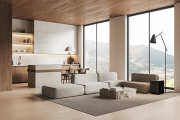 Stylish home studio interior with relaxing and cooking zone, panoramic window