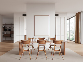 Modern dining room with wooden table and chairs, blank framed poster on the wall, large windows in the background, home decor concept.  3D Rendering