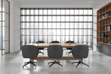 Office conference room interior with table and armchairs, panoramic window