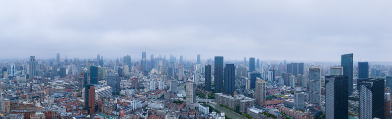 Aerial view of  heavily polluted city skyline and buildings at sunrise in Shanghai