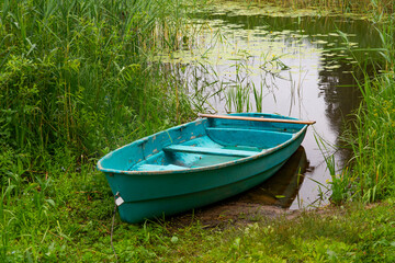 Boat on the shore of the lake, Belarus