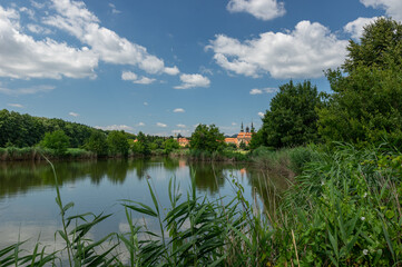 Fish pond in Velehrad, Czech Republic with Basilica of Saints Cyril and Methodius
