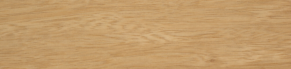 White limba veneer surface with a harmonious golden wood grain