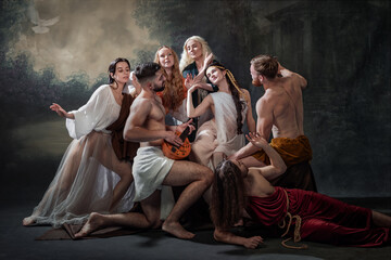 Gathering of Souls. group of people, dressed in flowing garments, gather around man playing lute...