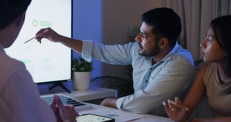 Group diverse Asia businesspeople talk ESG strategies risk management solar panel workshop night, SDGs, global warming, green finance and investment and net zero waste in boardroom training building.