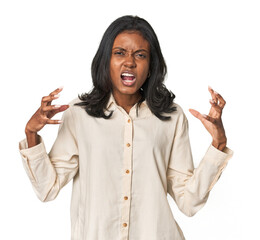Portrait of a young Indian woman screaming with rage.