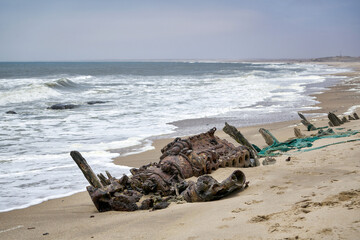 Remains of a sunken ship at the Skeleton Coast in Namibia