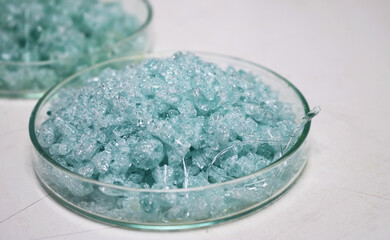 Samples of processed glass fragments for material development research.