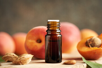 Apricot kernel oil in a brown glass bottle - healthy natural cosmetic product