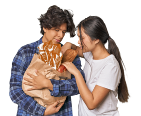 Multiracial young couple shopping for groceries in studio