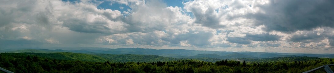 Obraz premium Panoramic landscape in mountains after the rain.