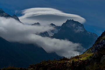 Lenticular cloud over the Caucasus mountains is one of the most beautiful and rare phenomena, in the village of Verhnya Balkaria,the Republic of Kabardino-Balkaria. Russia