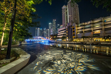 Singapore - September 13, 2023: River walk and buildings at night