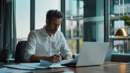 The businessman working in the office
