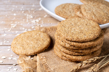 Healthy oatmeal cookies on wooden table