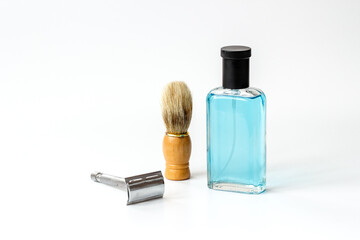 Men perfume and shaving tools. Male accessories close up