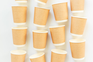 Many recyclable coffee paper cups, top view. Eco-friendly zero waste products