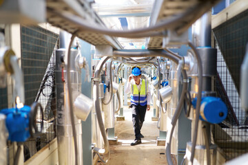 Engineer or technician checking air conditioner control valve at plumbing systems