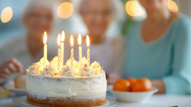 Senior celebrating a milestone birthday with loved ones