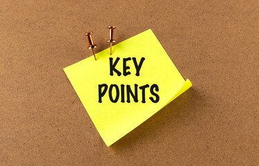 KEY POINTS text on yellow sticky on board background