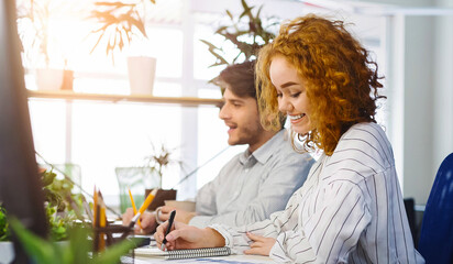 Young diverse millennial people working in coworking space, panorama