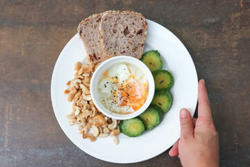 whole wheat bread or sourdough bread with nuts and soft boiled egg