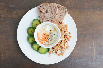 whole wheat bread or sourdough bread with nuts and soft boiled egg