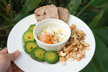 whole wheat bread or sourdough bread with nuts and soft boiled egg