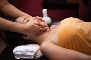 Young Beautiful Asian Woman relax massage in spa salon