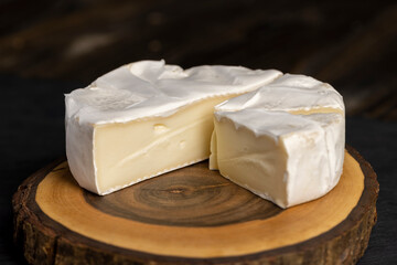 melted cheese with white mold on the table