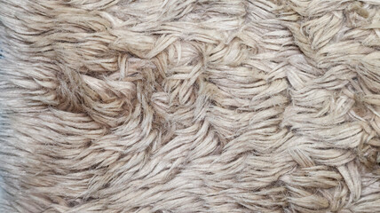 A soft, abstract, luxurious fur fabric texture background. Ideal for cozy, upscale interior designs, product photography, or fashion-related projects. Adds warmth and texture to any scene