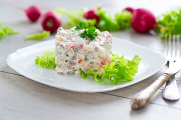 vegetable salad with boiled vegetables and dressed with mayonnaise