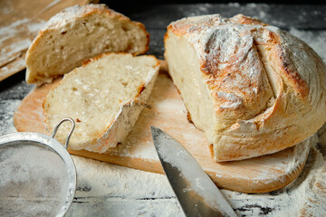 sliced fresh bread on a wooden table