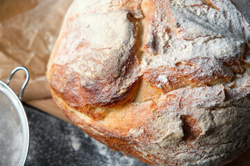 fresh bread sprinkled with flour close-up