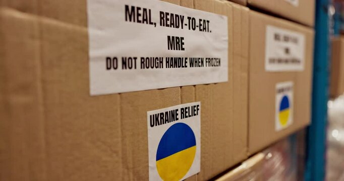 Ukraine, aid and donation boxes for shipping, ngo and crisis response or humanitarian help with food packages. Storage, outreach support and war relief, distribution and export with caution label