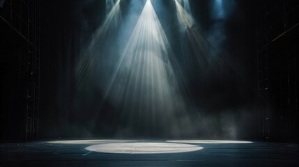 Obraz premium An empty stage with a spotlight shining down on it. There is a black curtain in the background.