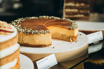 Pumpkin cheesecake with fall spices topped, dessert for Thanksgiving.