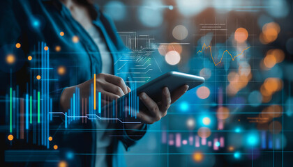 A person using a tablet with overlaying digital graphs and data points, symbolizing modern technology and data analysis in a futuristic, high-tech environment