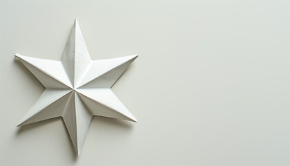 A minimalist silver star ornament with clean lines, placed against a plain white background, epitomizing modern and elegant holiday decoration