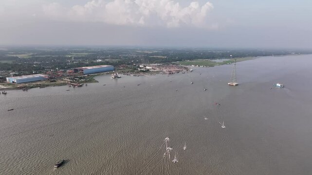 Aerial view of Padma River Floating lots of boats at Mawa Launch Terminal.