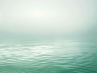 Obraz premium An endless expanse of blue unfolds above and below, sunlit waves dance on the horizon in a breathtaking summer seascape