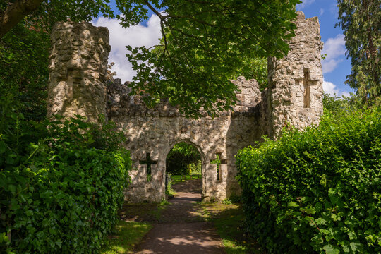Castle Grounds, a public park in Reigate, Surrey, UK. While the castle no longer exists, a mock medieval gateway was built over the ruins in 1777.