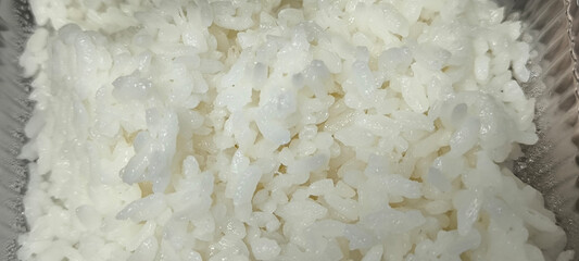 Steamed rice is a staple food in Asians.