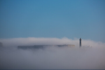 World famous red steel suspension bridge in San Francisco port entrance with Golden Gate State park...