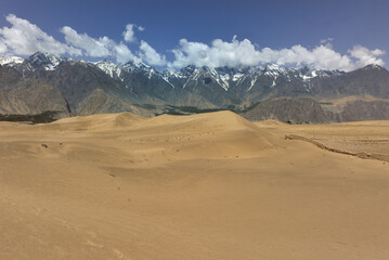 DESERT WITH SAND DUNES AROUND THE TOWN OF SKARDU IN NORTHERN PAKISTAN AT THE FOOT OF THE HIMALAYAS. 