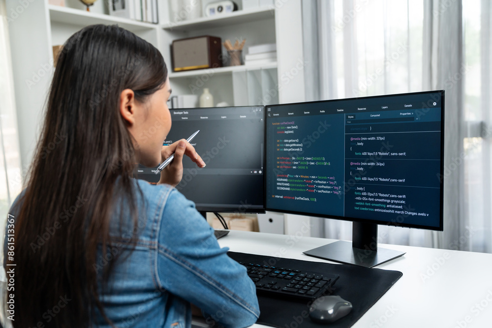 Poster young asian it developer looking online information on pc for beautiful pose with coding program dat
