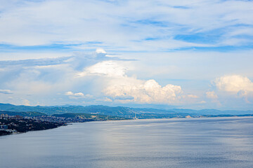 Opatija  Croatia - may 27 2024:  Coastal Cityscape With Blue Sky and White Clouds in the Afternoon