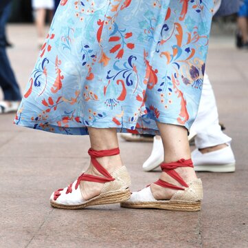 A sardanista woman dancing sardanes, a catalan regional dance, and wearing espardenyes, the traditional shoes of the dancers 