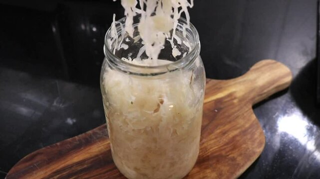 Jar of Sauerkraut German Fermented Food Cabbage Healthy Bacteria Gut Health Fork